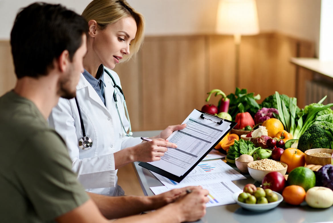 Nurse conducting a functional nutrition assessment as part of integrative health training.