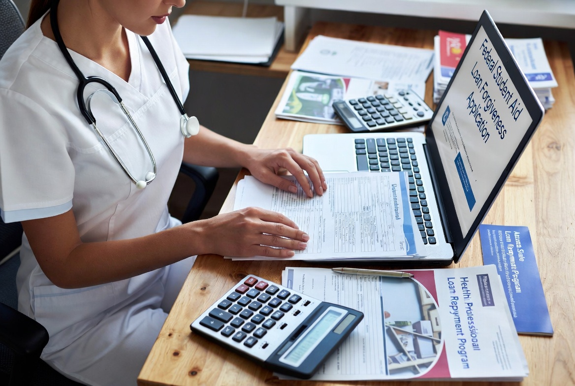 Nurse evaluating federal loan and forgiveness options for nursing school in Arizona.