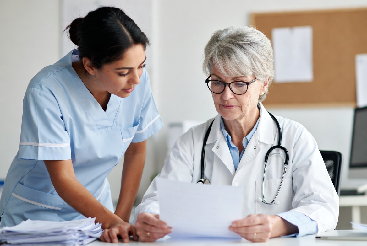 Nurse educator giving guidance to a student choosing a nursing program